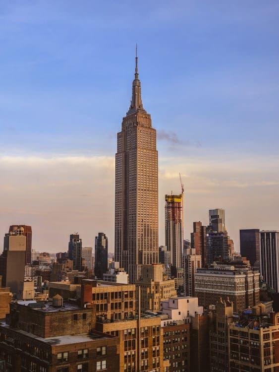 Empire State Building and Manhattan skyline at sunset